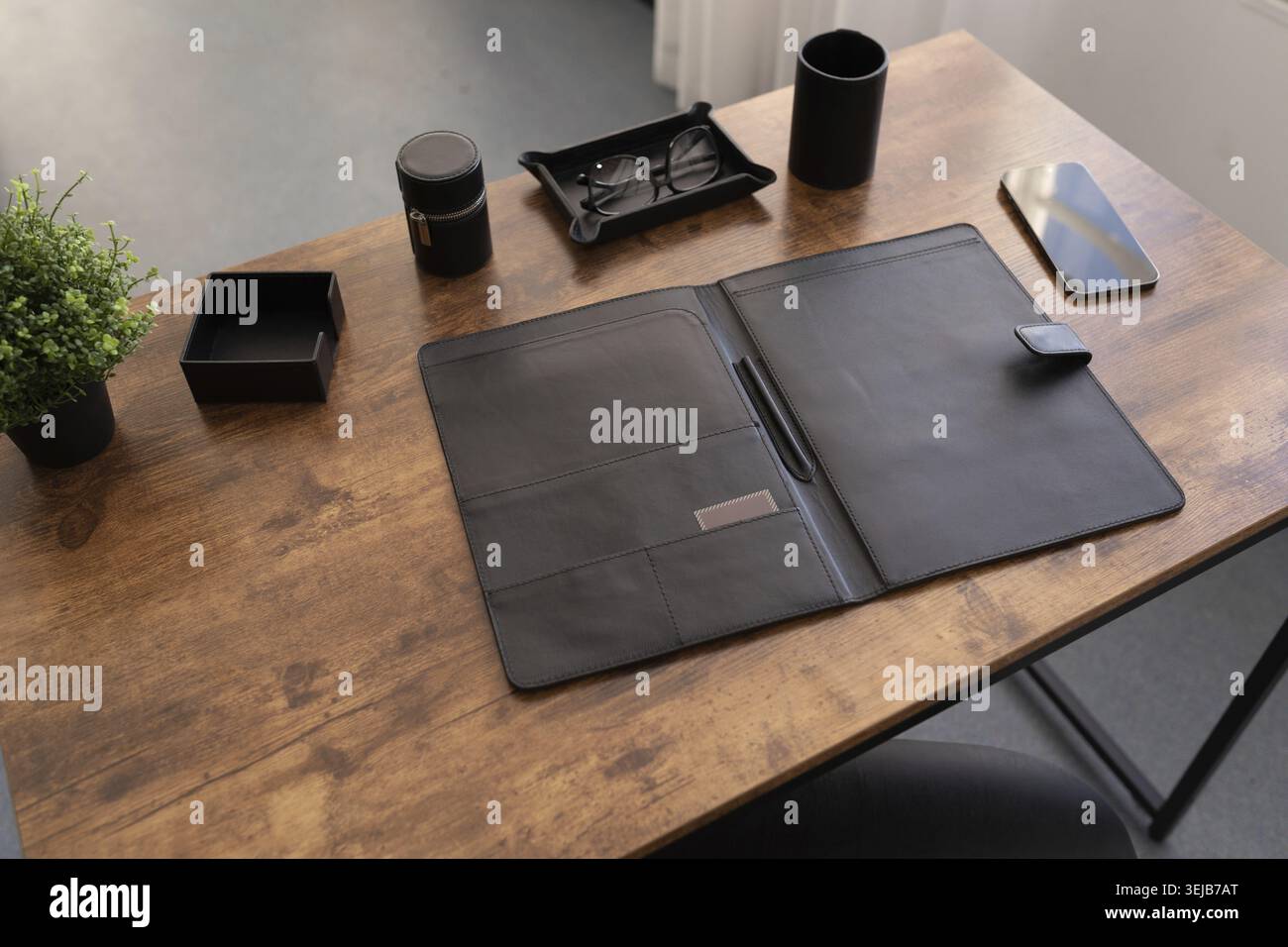 Open leather folder for documents on the desktop Stock Photo