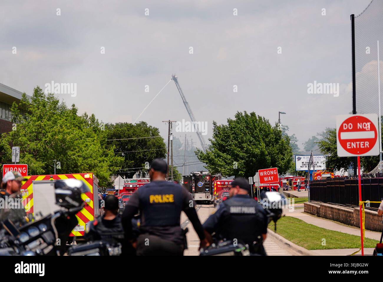 Police and firefighting crews respond to the scene of a large fire at ...