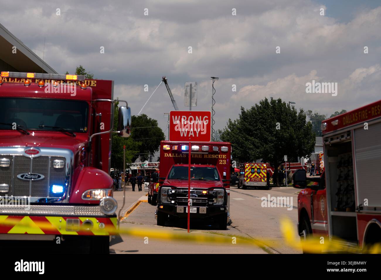 Police and firefighting crews respond to the scene of a large fire at ...