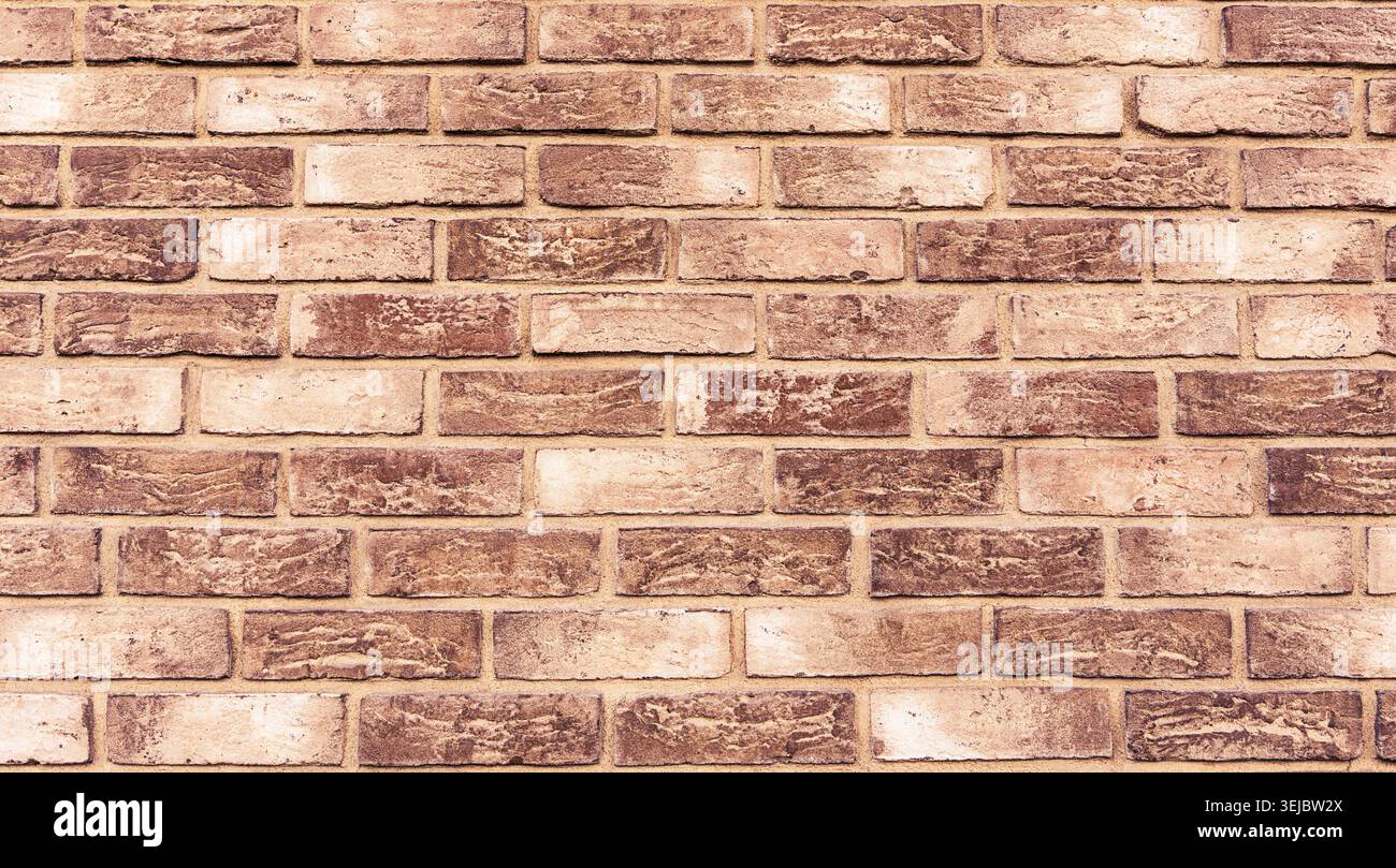 Beige brick wall texture background with rustic brick pattern Stock Photo