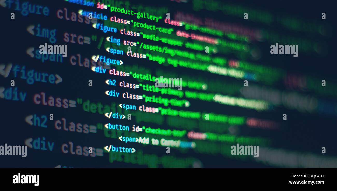 Blurred HTML and CSS web development syntax code displayed on a computer screen Stock Photo