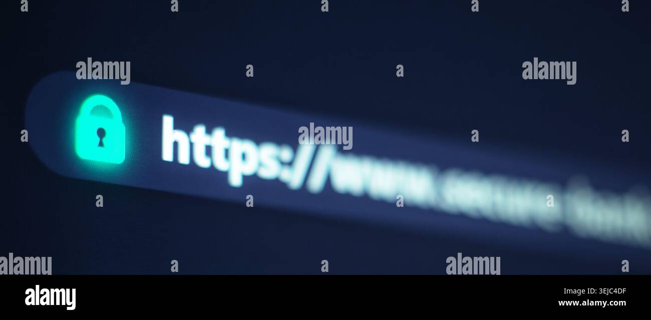 Close up of a web browser address bar displaying a glowing green padlock and secure https URL on a computer screen Stock Photo
