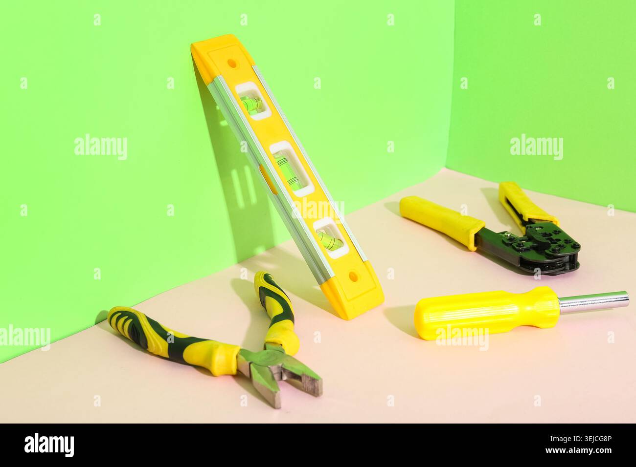 Different construction tools on color background Stock Photo