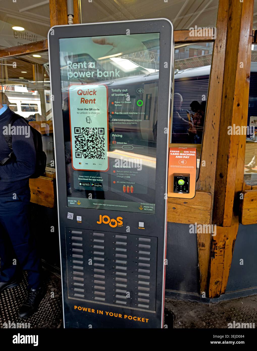 Joos rent-a-power-bank kiosk at Manchester Oxford Road station, offering portable phone charging for rail passengers Stock Photo