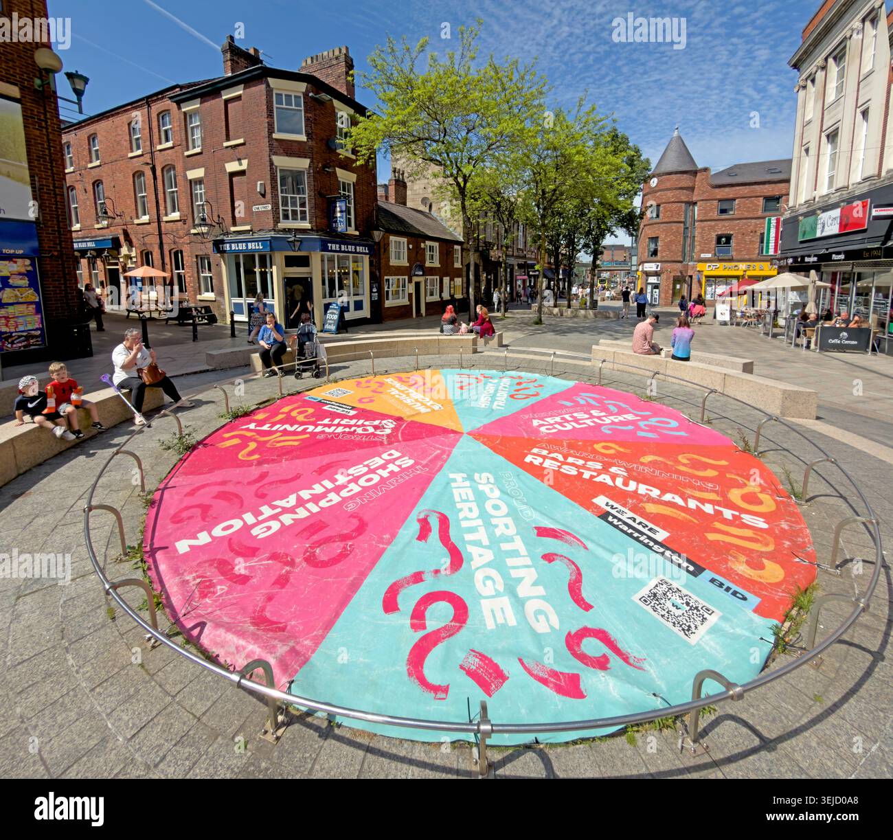 Blue Bell pub and colourful pavement artwork on Horsemarket Street, Warrington, Cheshire, England, UK. Stock Photo