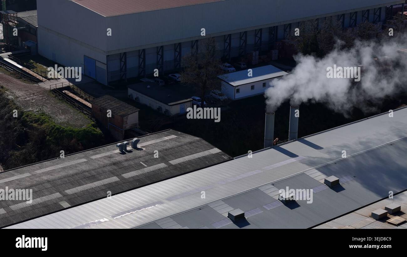 Aerial view of a large industrial complex with multiple buildings and ...