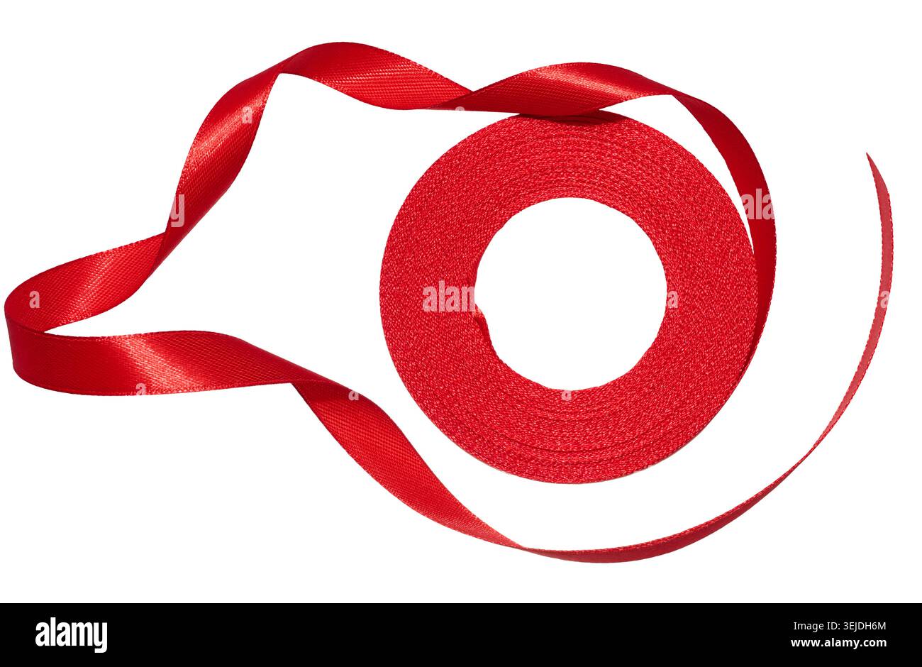 A spool with a red silk ribbon on a white isolated background Stock Photo