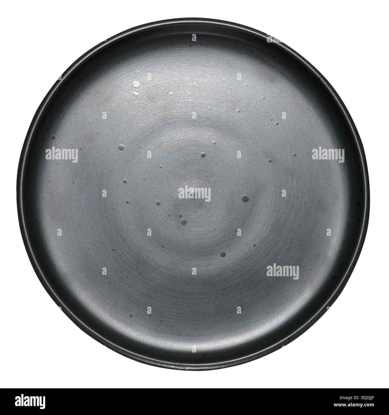Empty black ceramic plate on isolated background Stock Photo