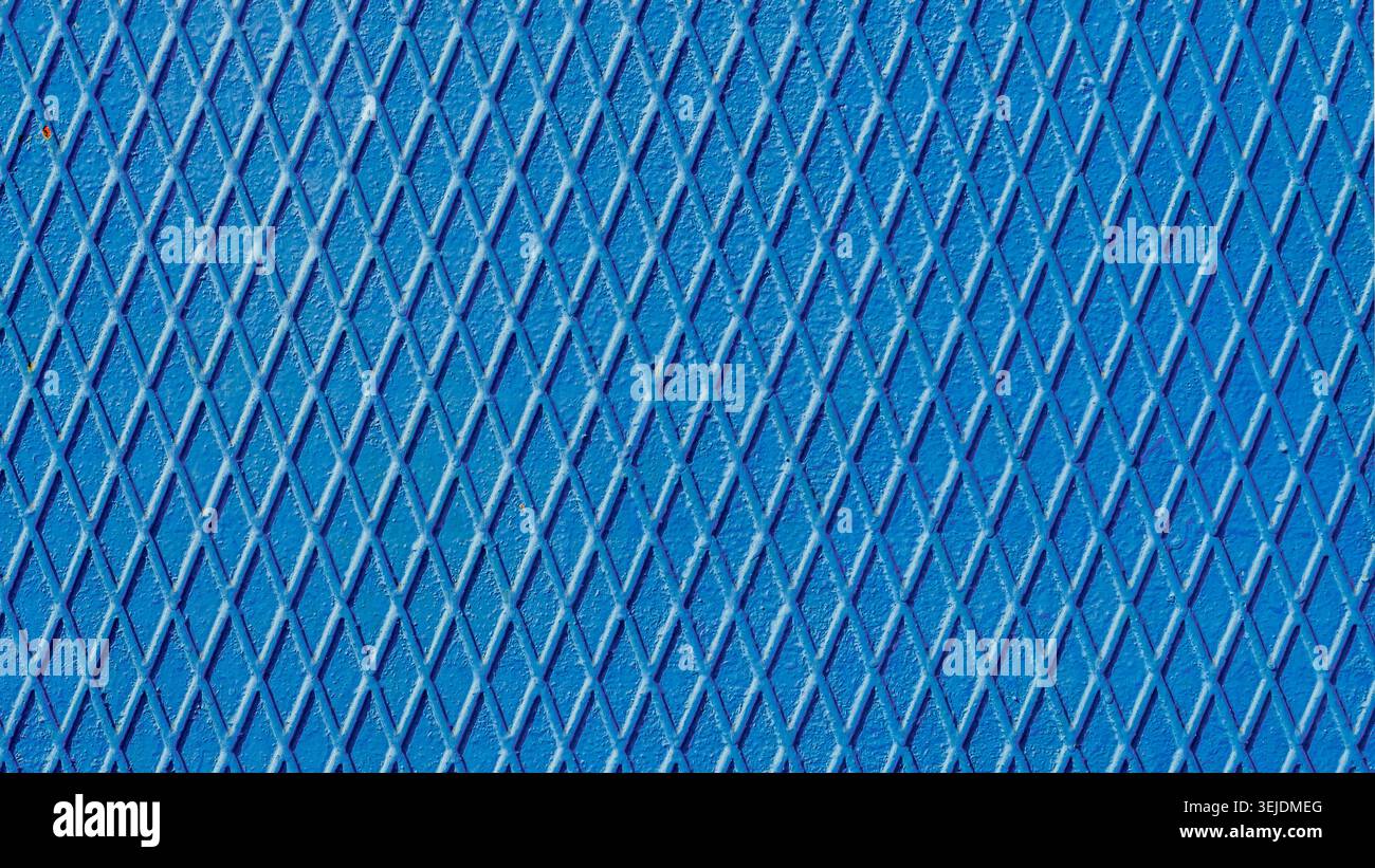 Blue iron wall with intersecting lines close up Stock Photo
