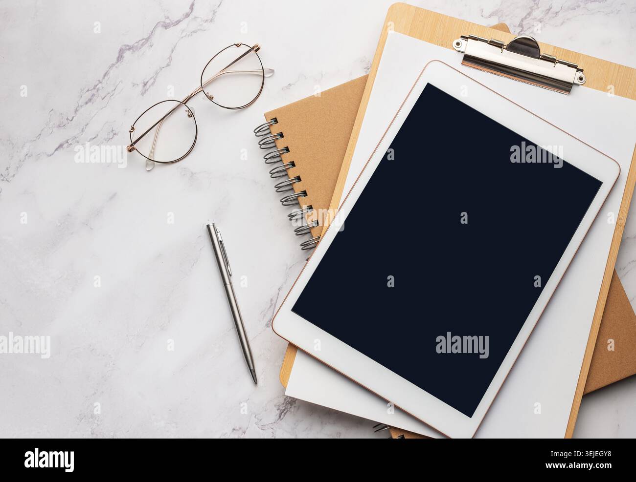 Tablet pc  and notebooks  on the office desk Stock Photo
