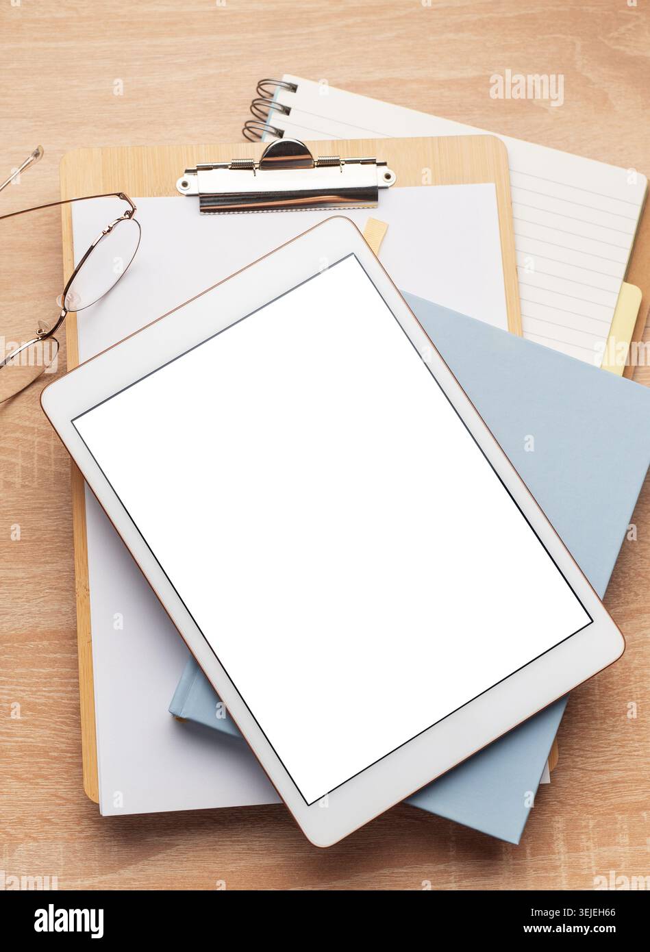 Tablet pc  and notebooks  on the office desk Stock Photo