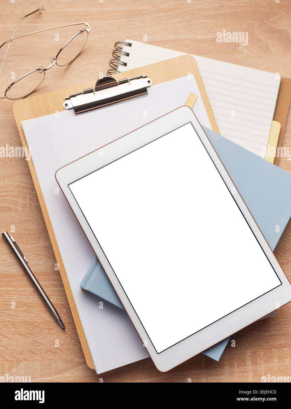 Tablet pc  and notebooks  on the office desk Stock Photo