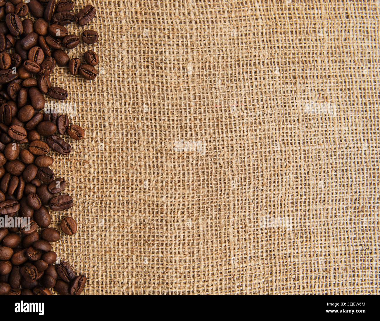 Coffee beans on a rough sacking Stock Photo