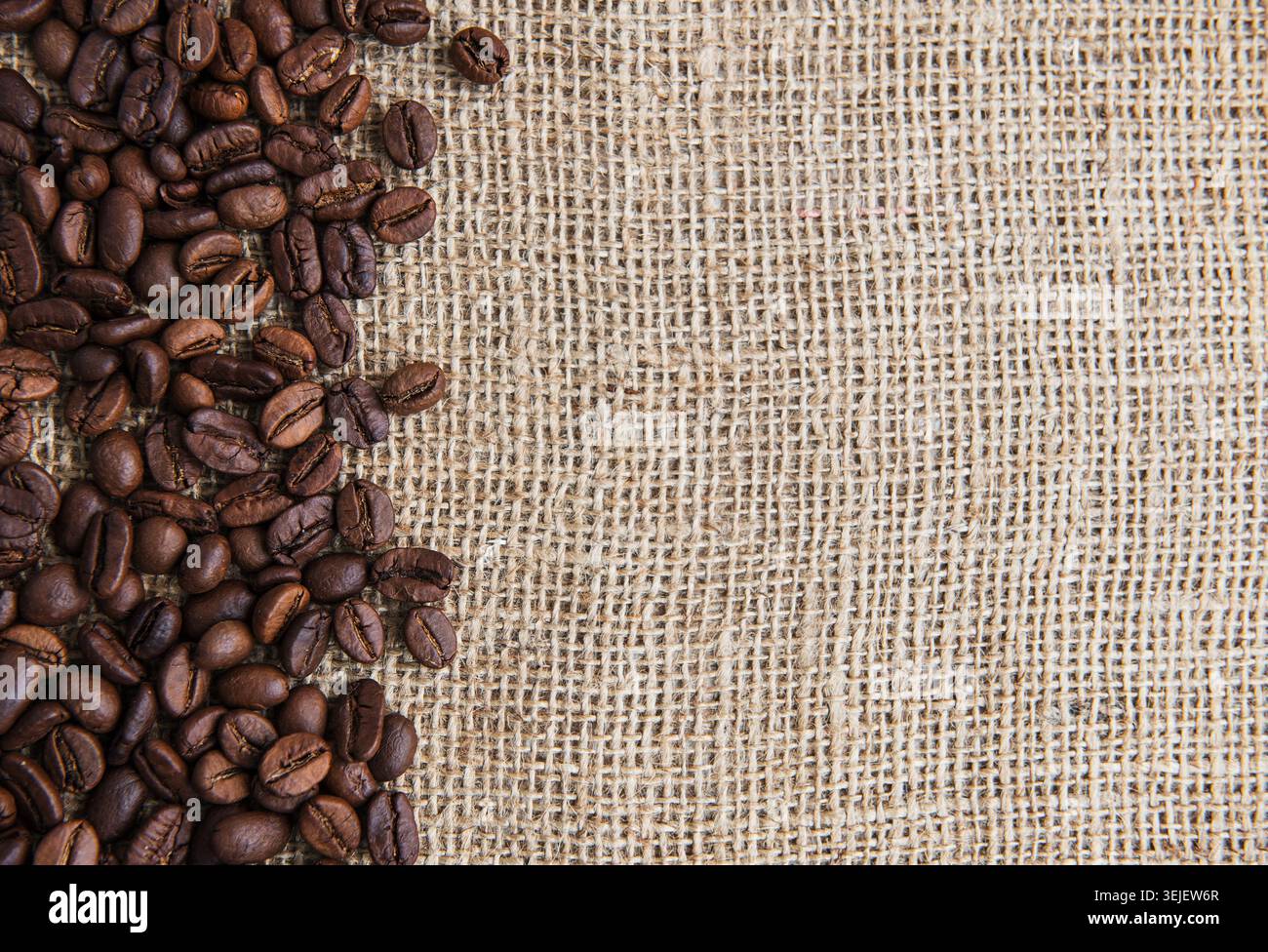 Coffee beans on a rough sacking Stock Photo