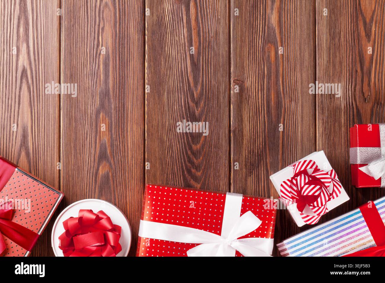 Gift boxes on wooden table Stock Photo