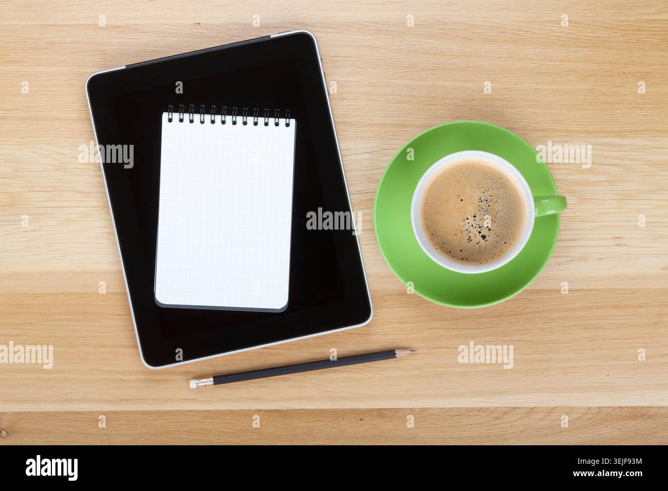 Touch screen tablet computer, notepad, pencil and cup of coffee Stock Photo
