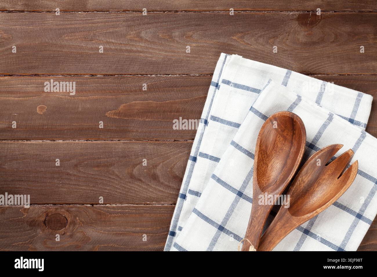 Kitchen utensil over wooden table Stock Photo
