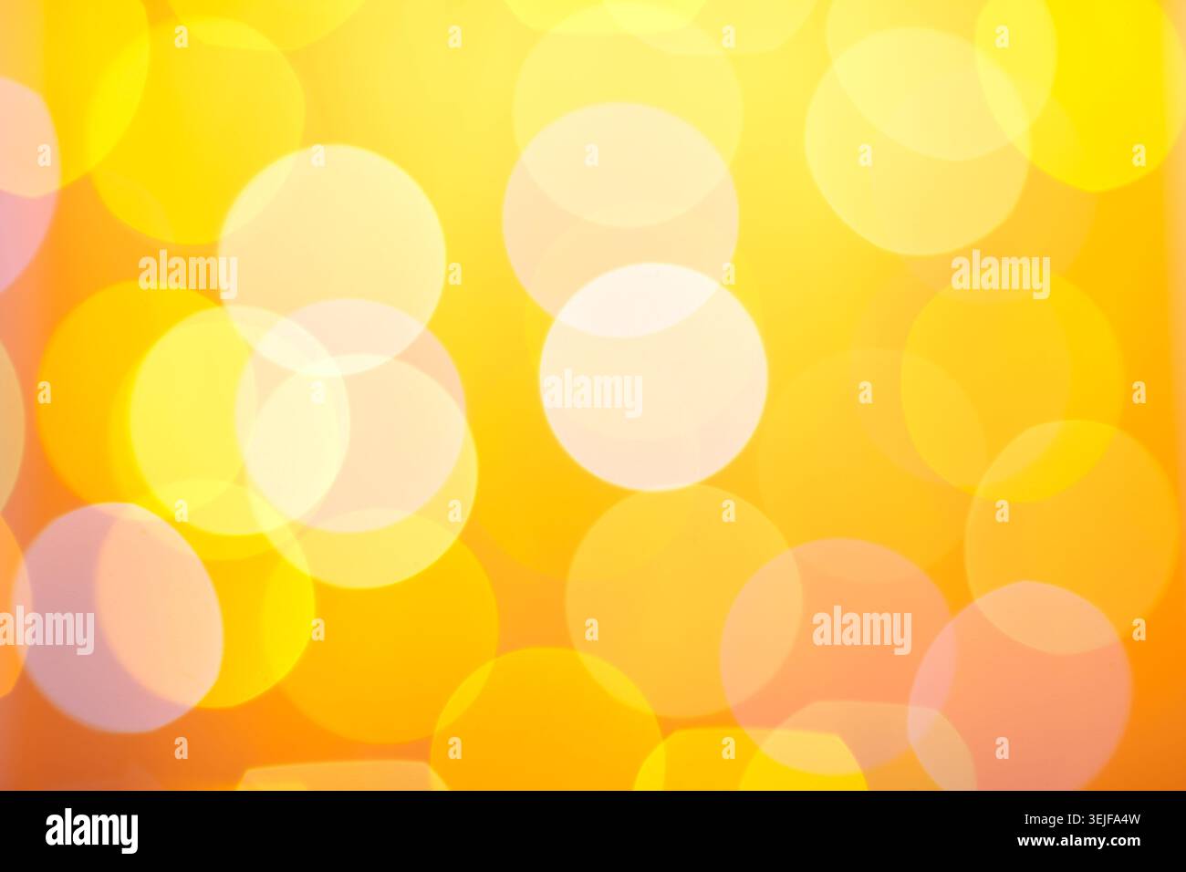 Abstract sunny bokeh on yellow Stock Photo