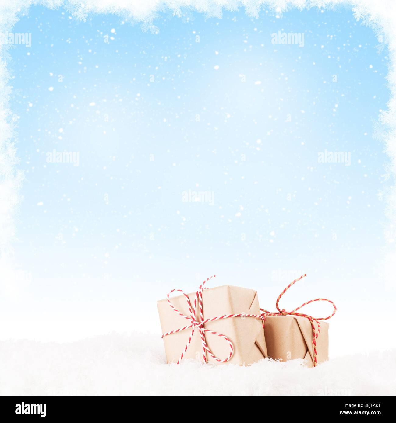 Christmas gift boxes in snow Stock Photo