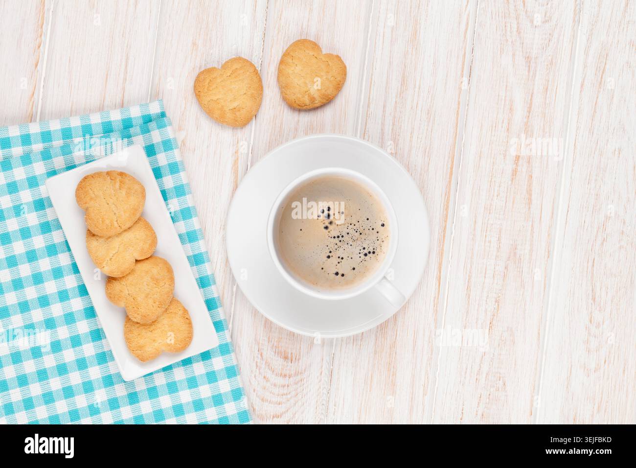 Coffee and heart shaped cookies Stock Photo