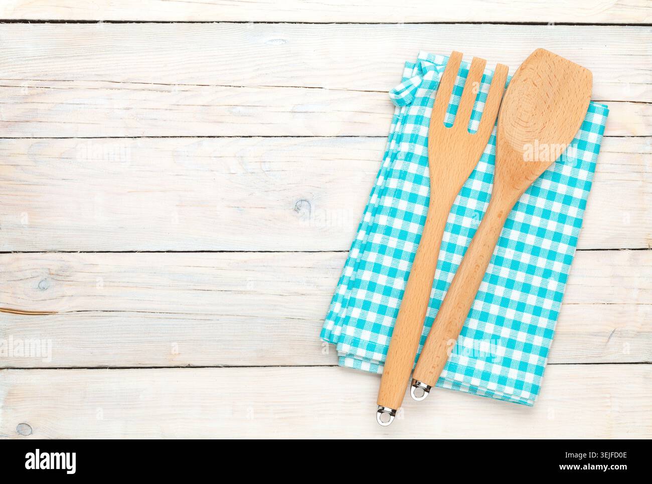 Kitchen utensil over white wooden table background Stock Photo