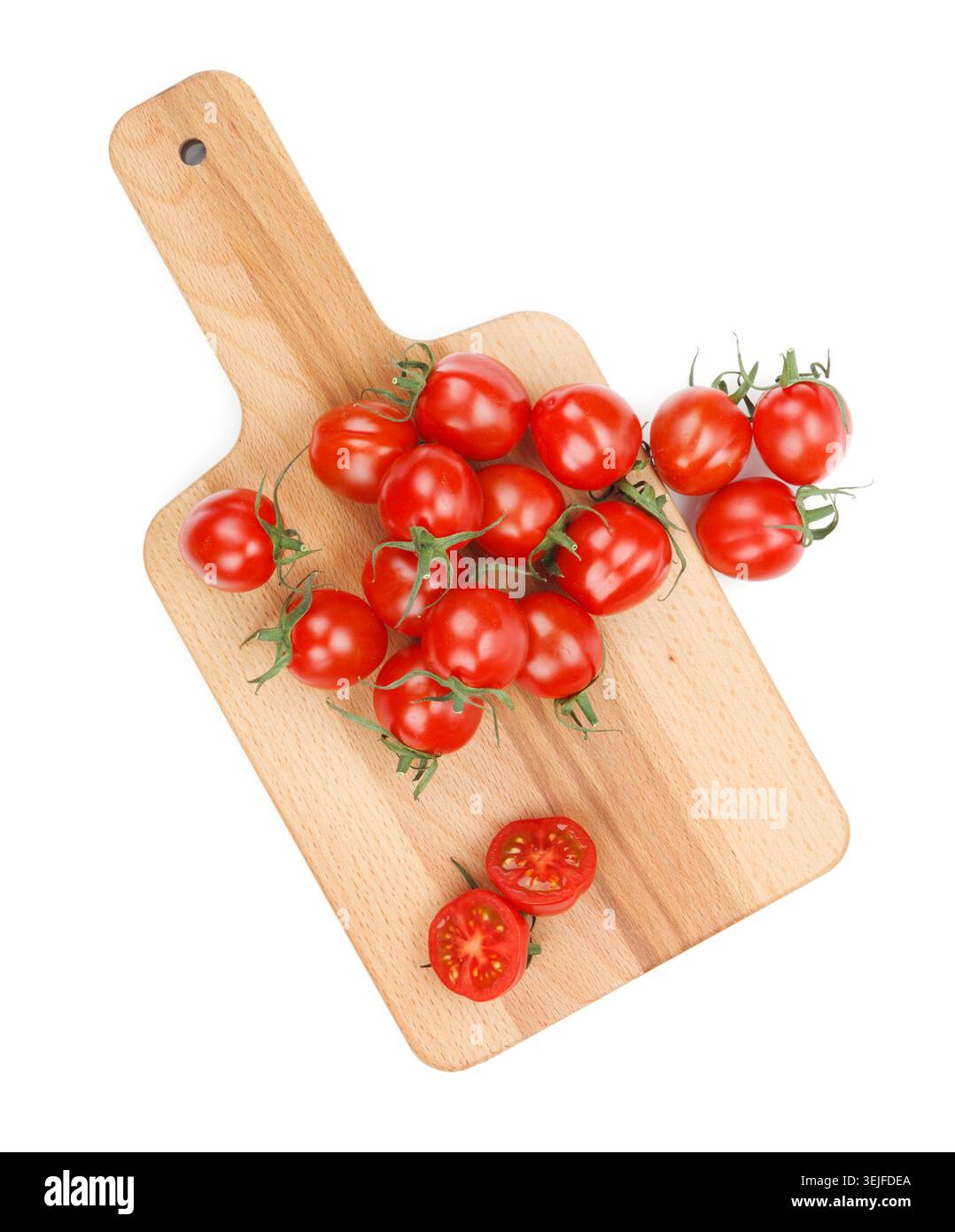 Cherry tomatoes on cutting board Stock Photo