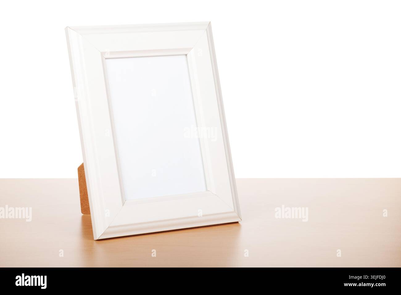 Photo frame on wood table Stock Photo