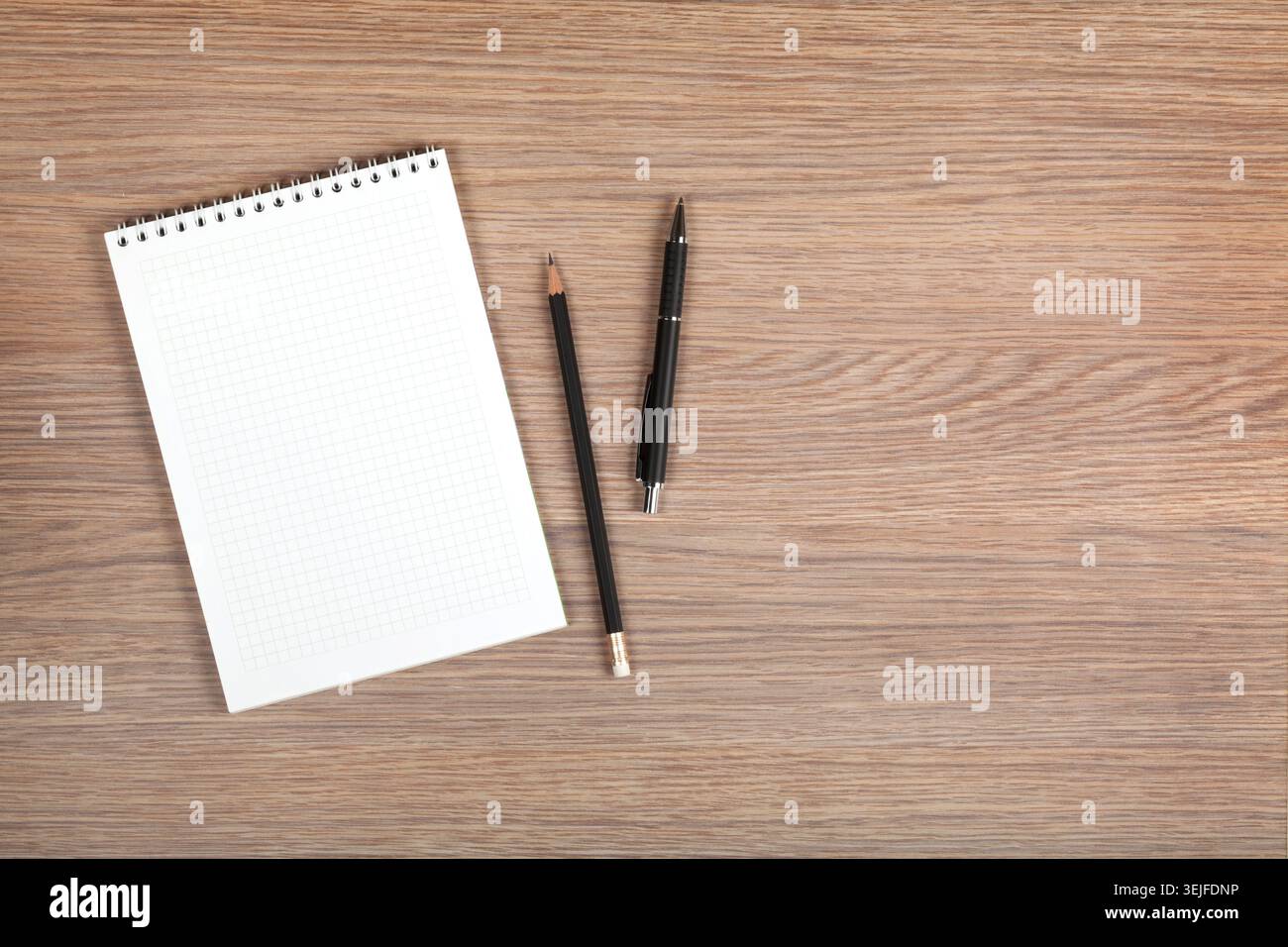 Blank notepad with pen and pencil Stock Photo