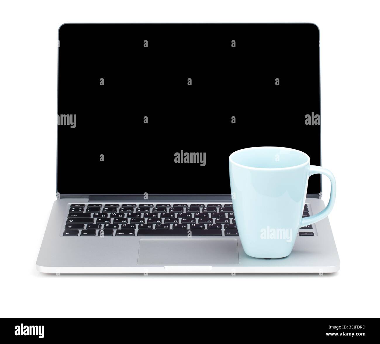 Tea cup on laptop Stock Photo