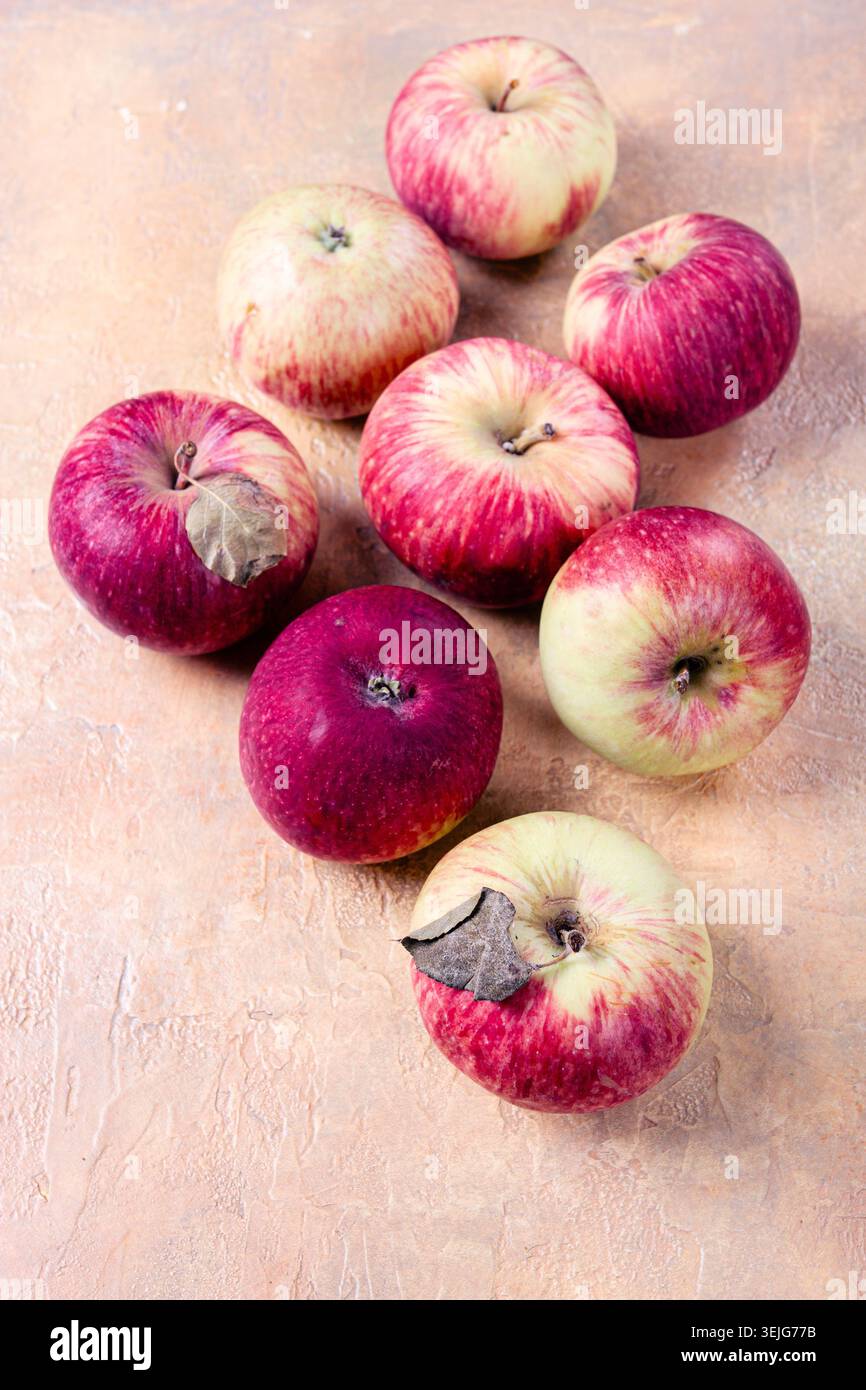 Apples scattered on the table, selective focus, yellow - red, summer variety, early, no people, Stock Photo