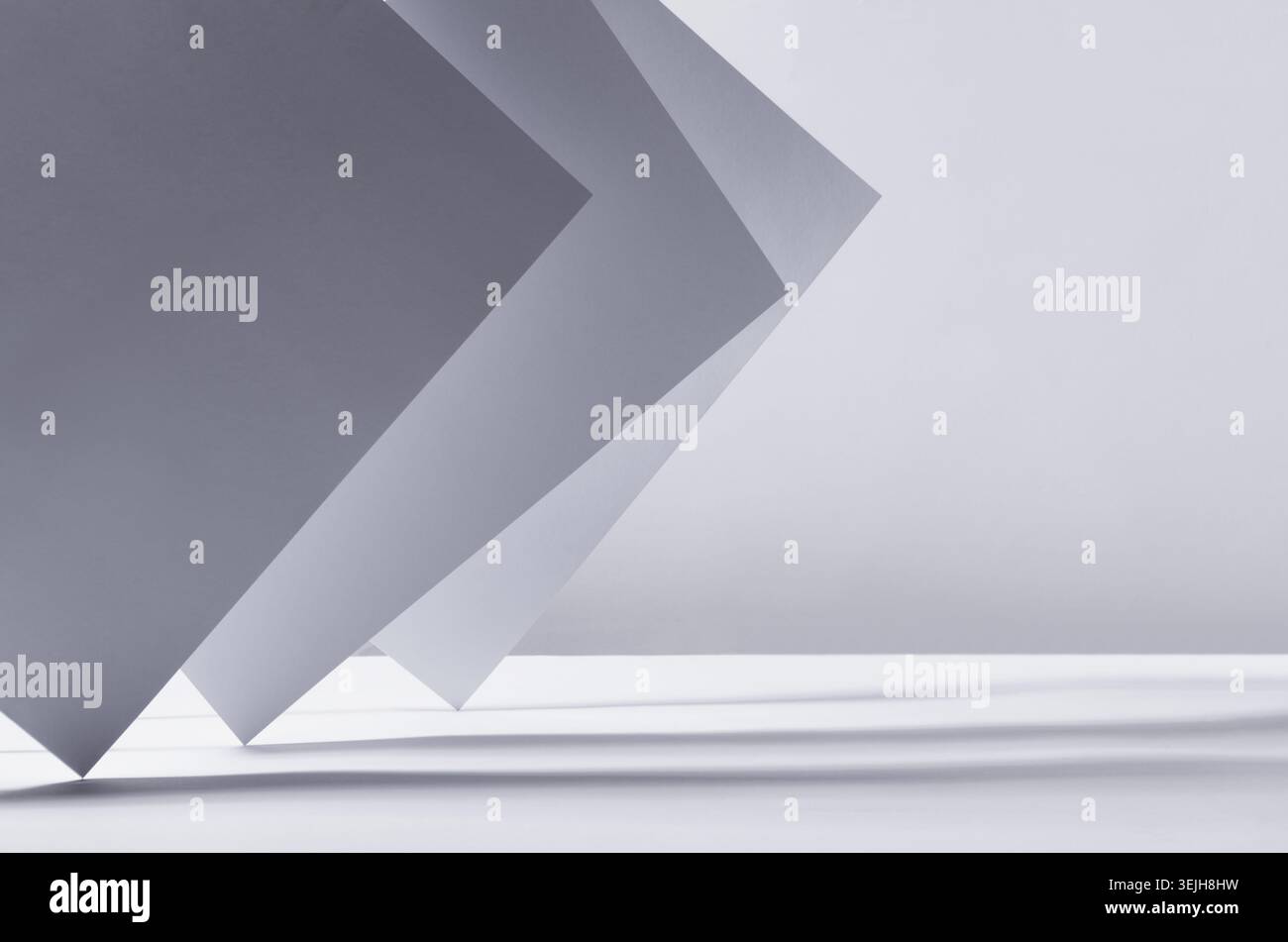 Abstract white grey minimalist background with asymmetric standing sheets with perspective, light and shadow, stripes as border, Stock Photo