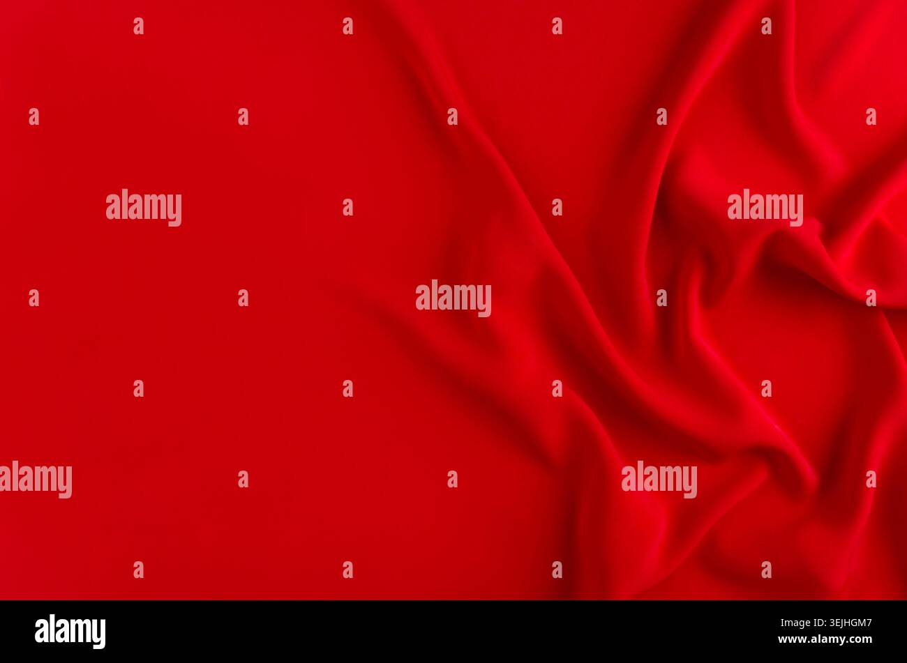 Deep red silk smooth background with copy space. Abstract love backdrop. Stock Photo