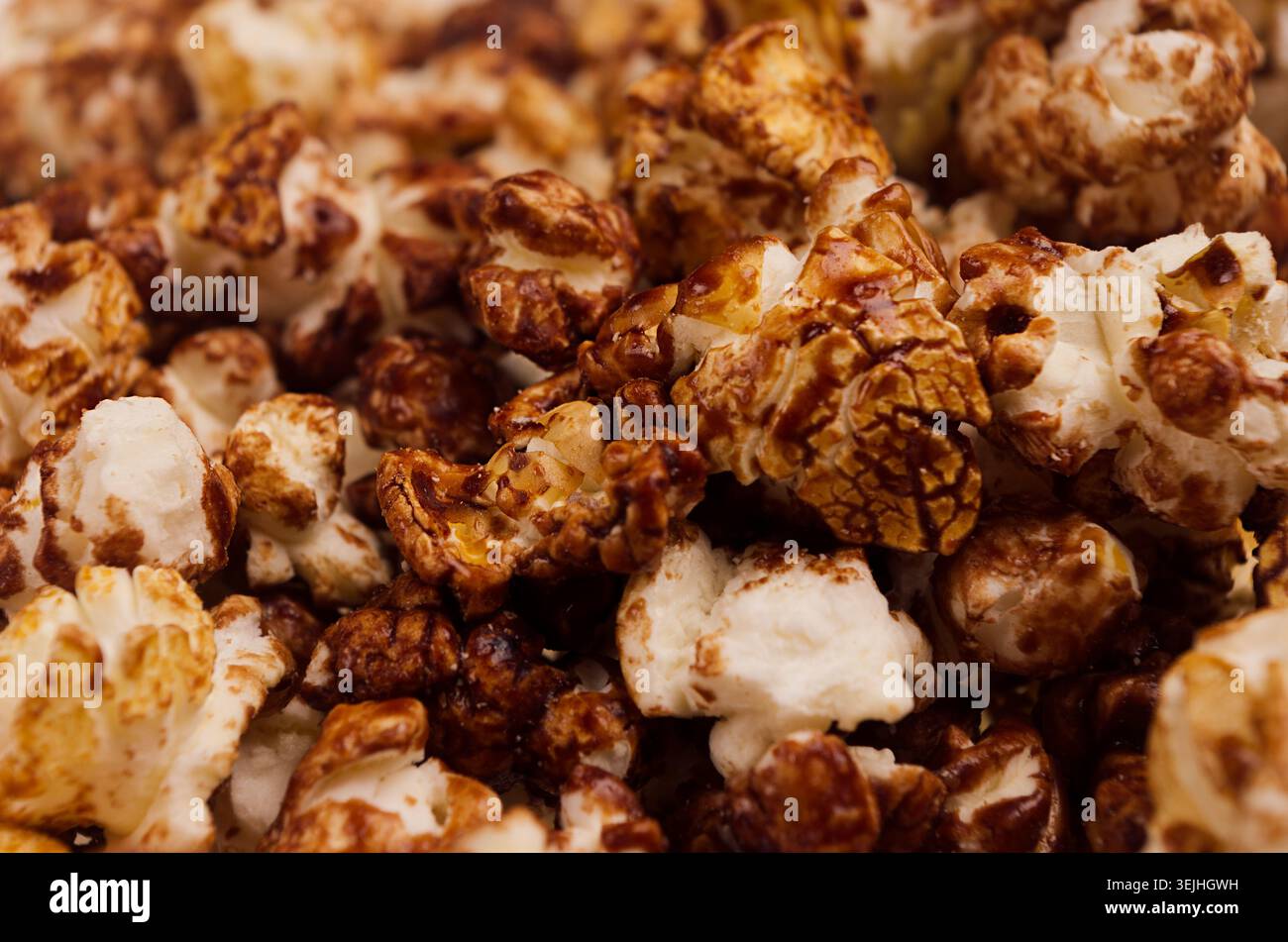 Chocolate popcorn macro with blur background. Stock Photo