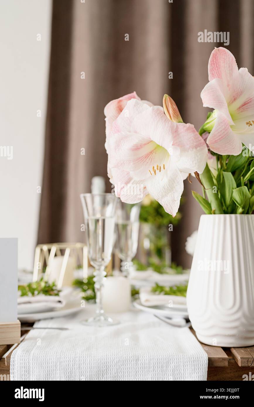 The wedding table setting and decor on wooden table in rustic style Stock Photo