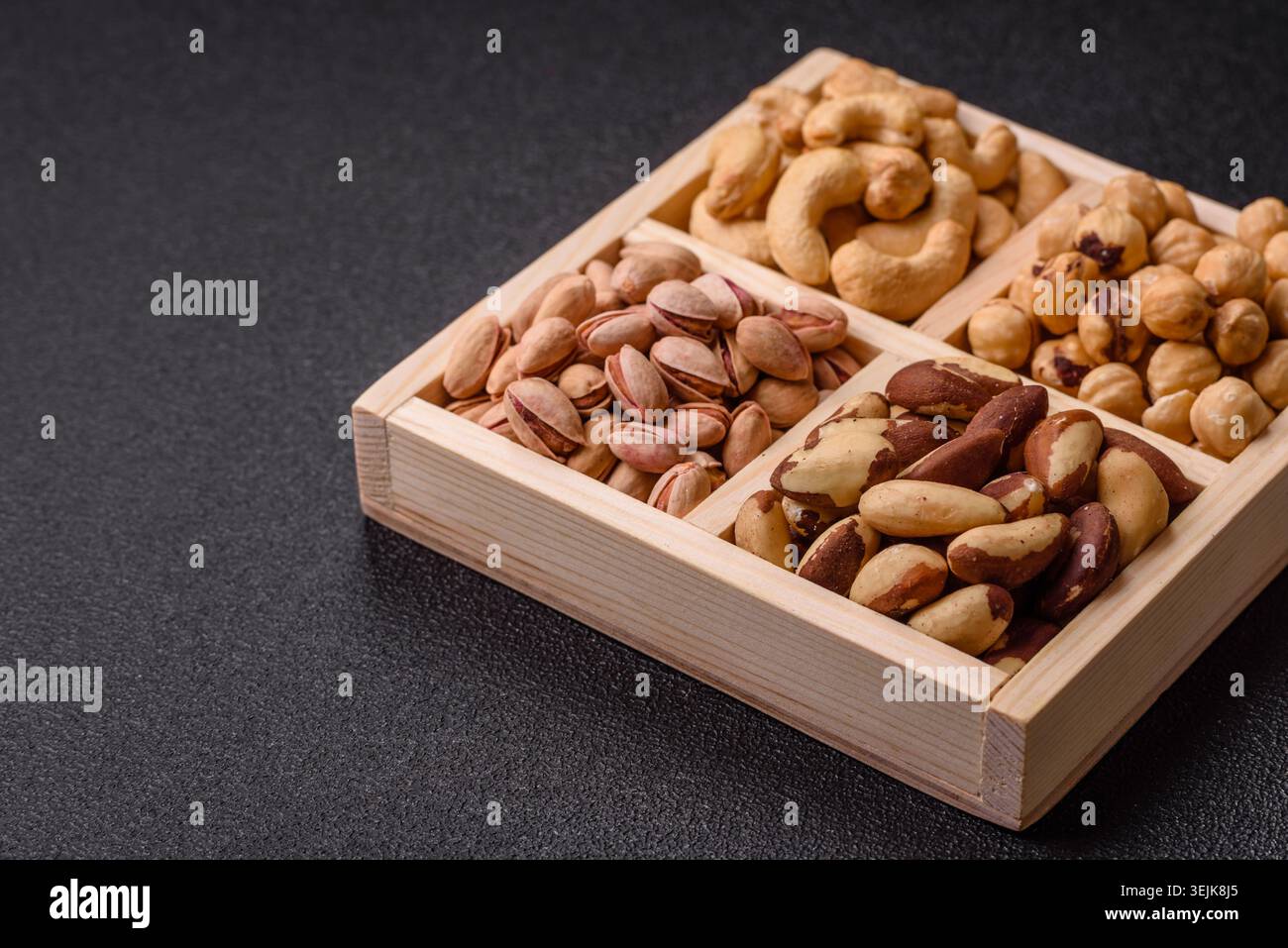 A box of cashews, hazelnuts, pistachios, and Brazil nuts as healthy ...