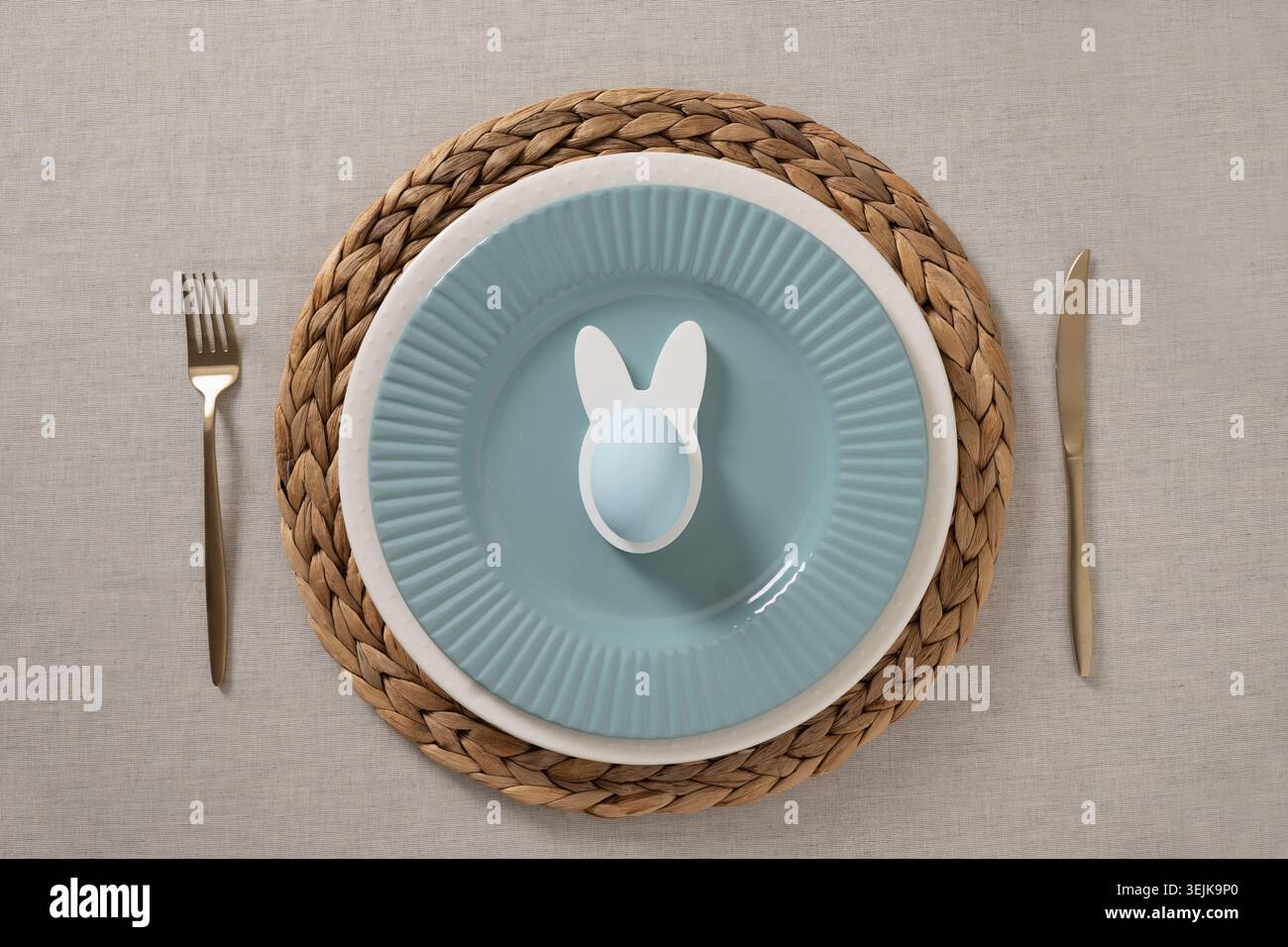 Easter table setting with bunny egg decoration Stock Photo