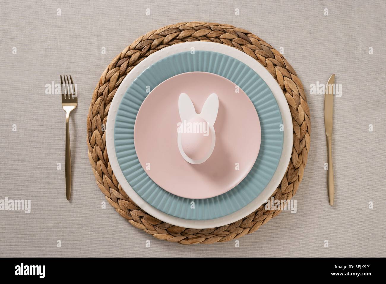 Easter table setting with bunny egg decoration Stock Photo
