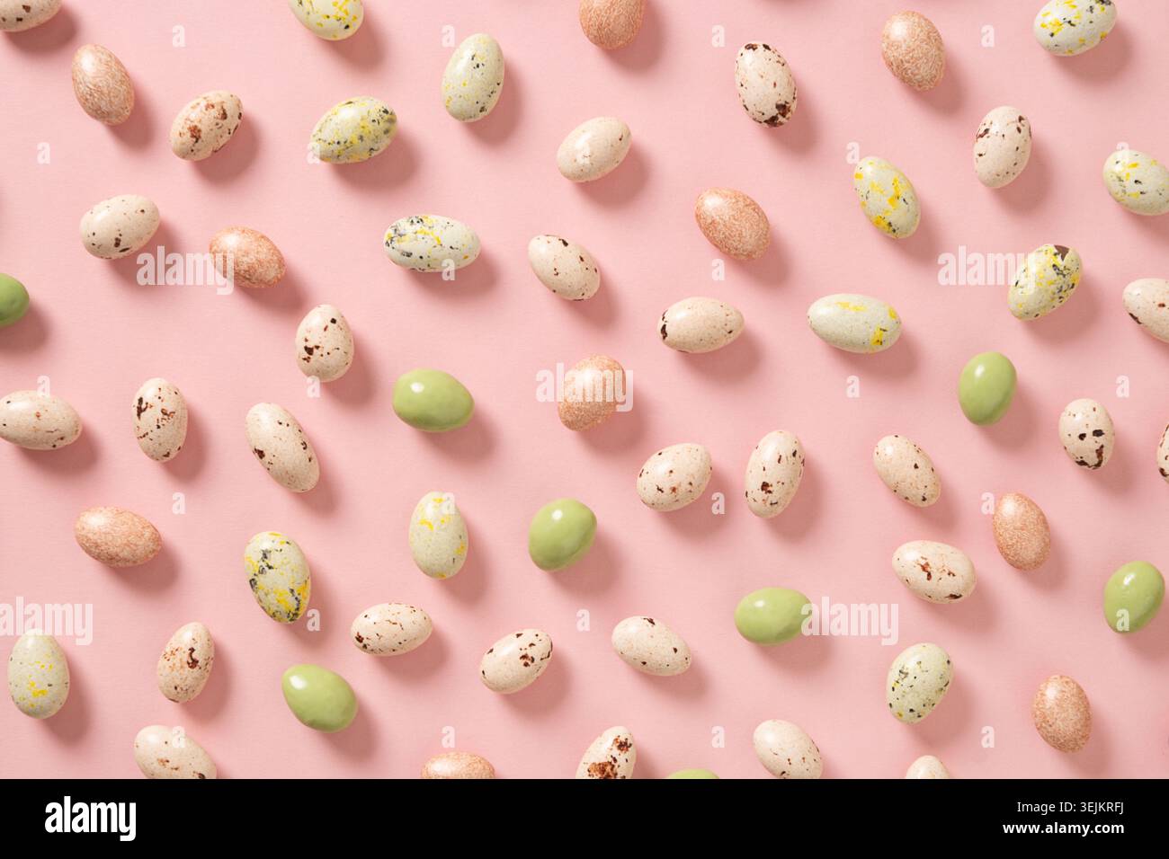 Easter white and pink chocolate candy sweets as eggs. Stock Photo