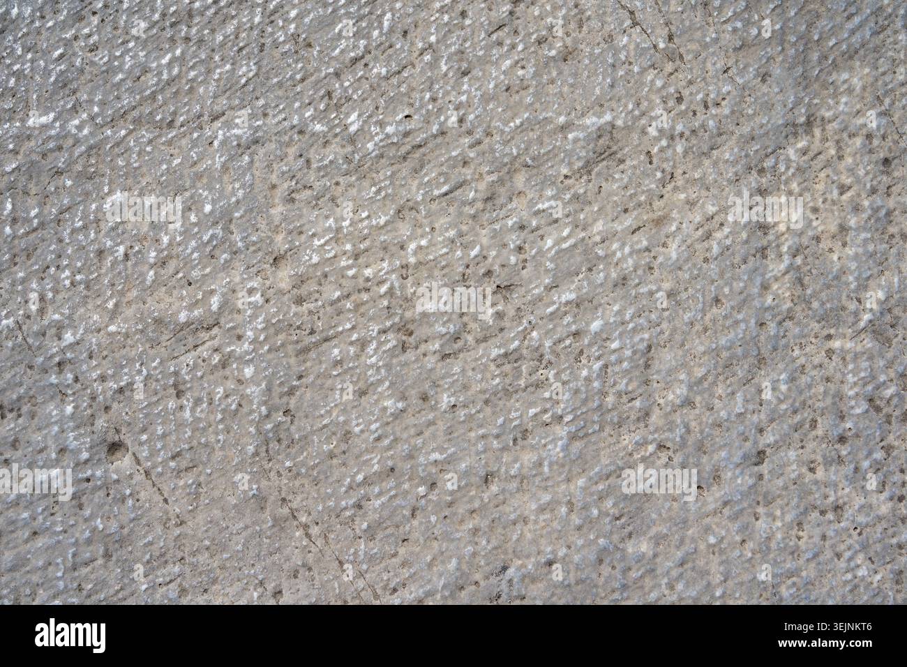 Natural Gray Limestone Texture Background with Detailed Stone Surface Pattern. Stock Photo