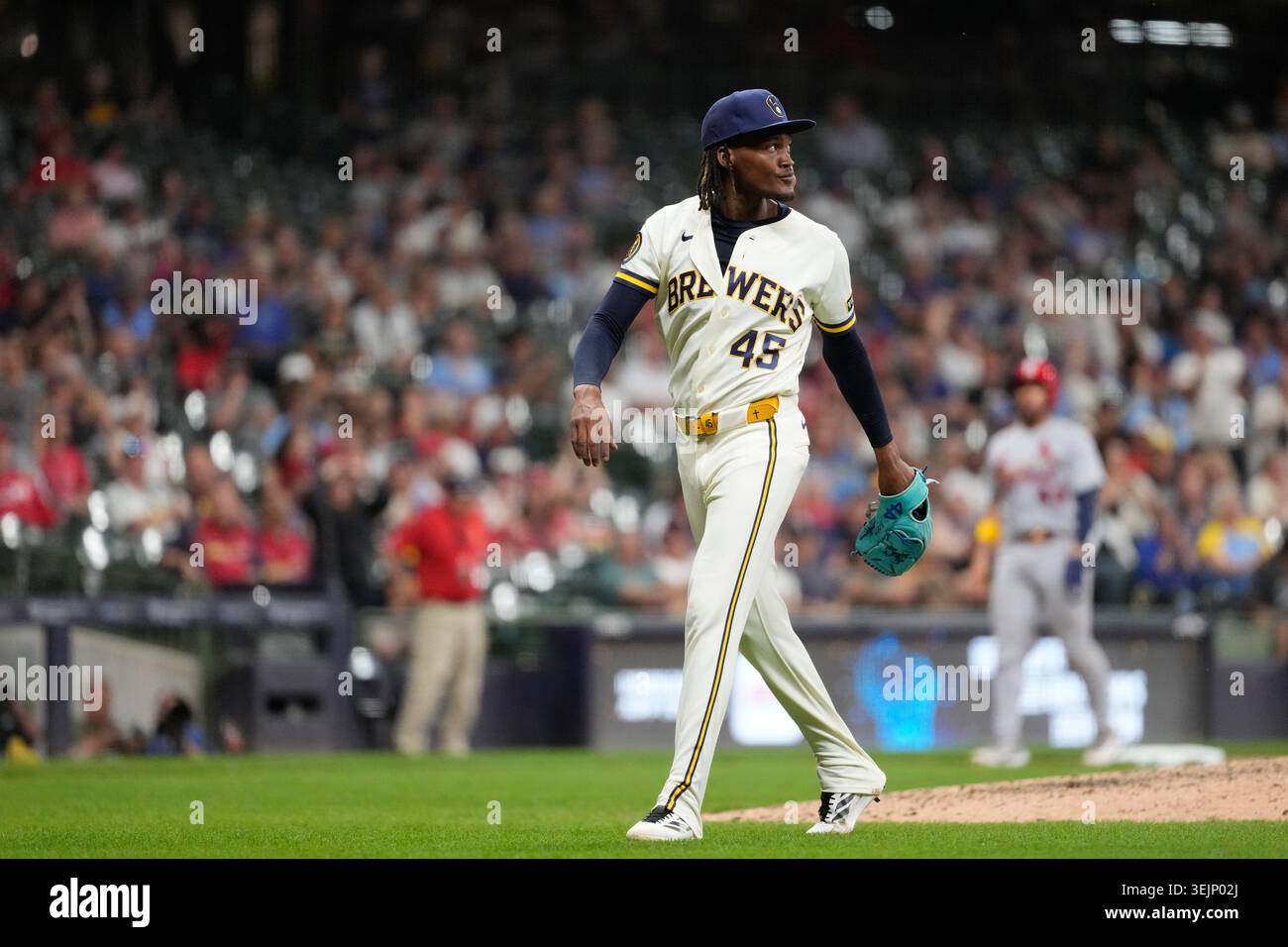 Milwaukee Brewers' Abner Uribe looks on during a baseball game against ...