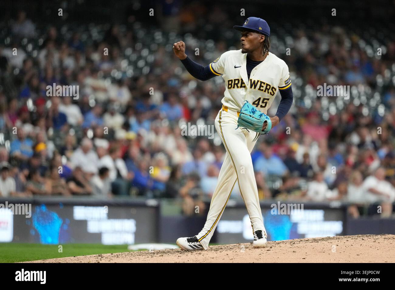 Milwaukee Brewers' Abner Uribe pitches during a baseball game against ...