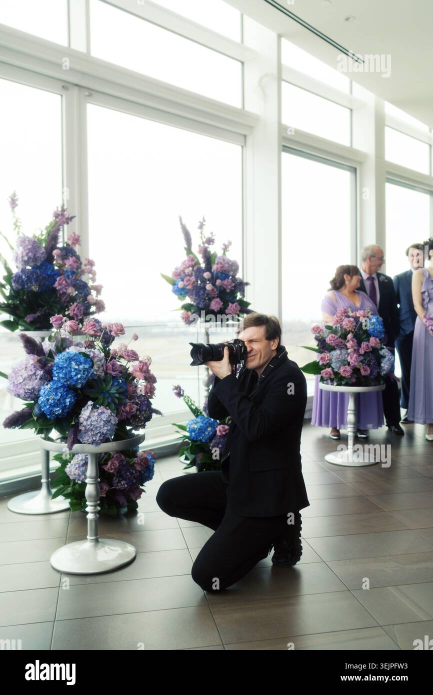 Toronto, Canada - May 10, 2026: Wedding Photographer Capturing Ceremony Moments Stock Photo
