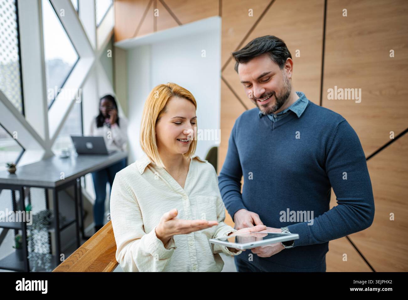 Business colleagues collaborating using digital tablet in office Stock Photo