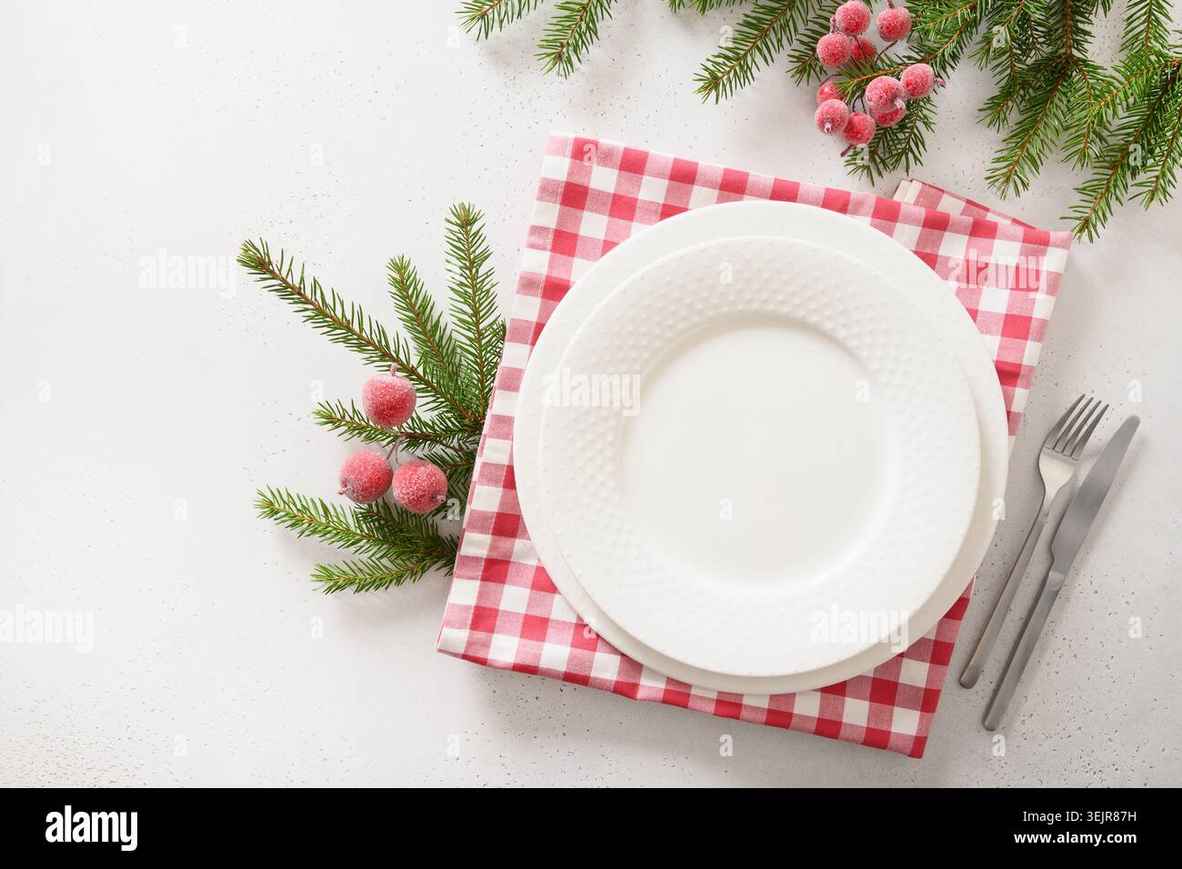 Christmas table setting with elegant red decorations. View from above. Stock Photo
