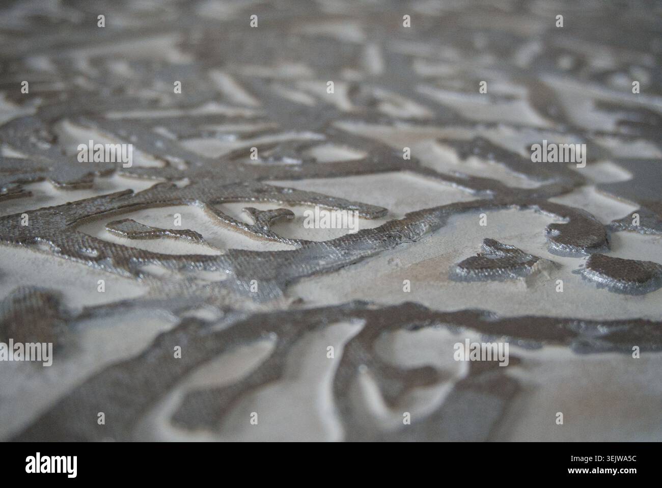 Textured Metallic Silver Melted Liquid Surface Pattern Stock Photo