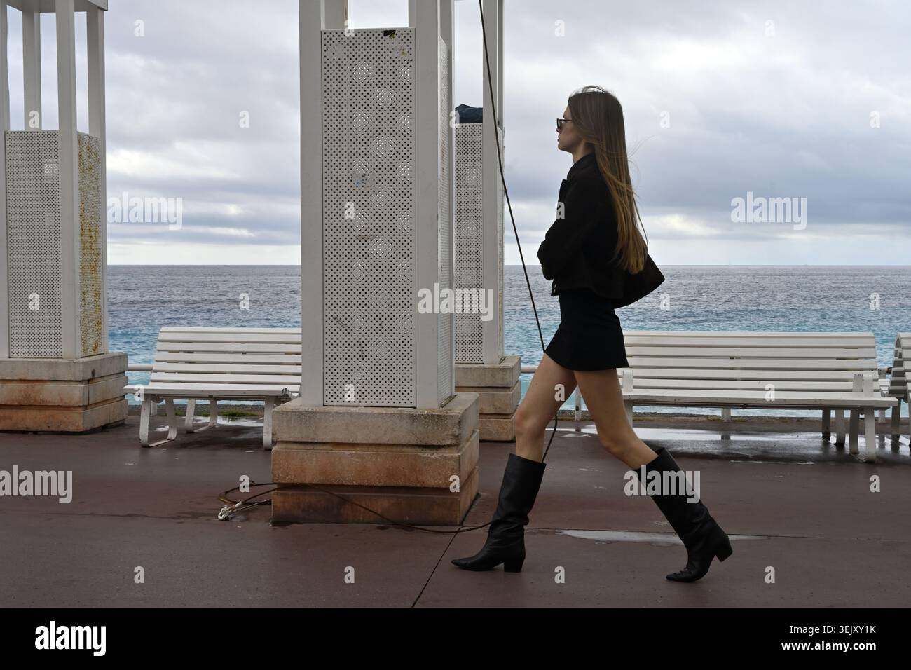 Woman in short skirt and boots hi-res stock photography and images - Alamy