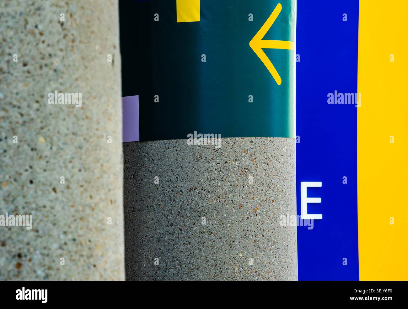 Round concrete pillars on a building Stock Photo