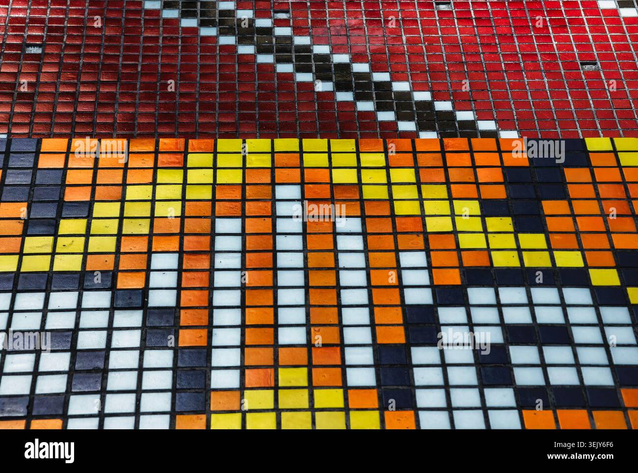 Geometric tile designs on a wall Stock Photo