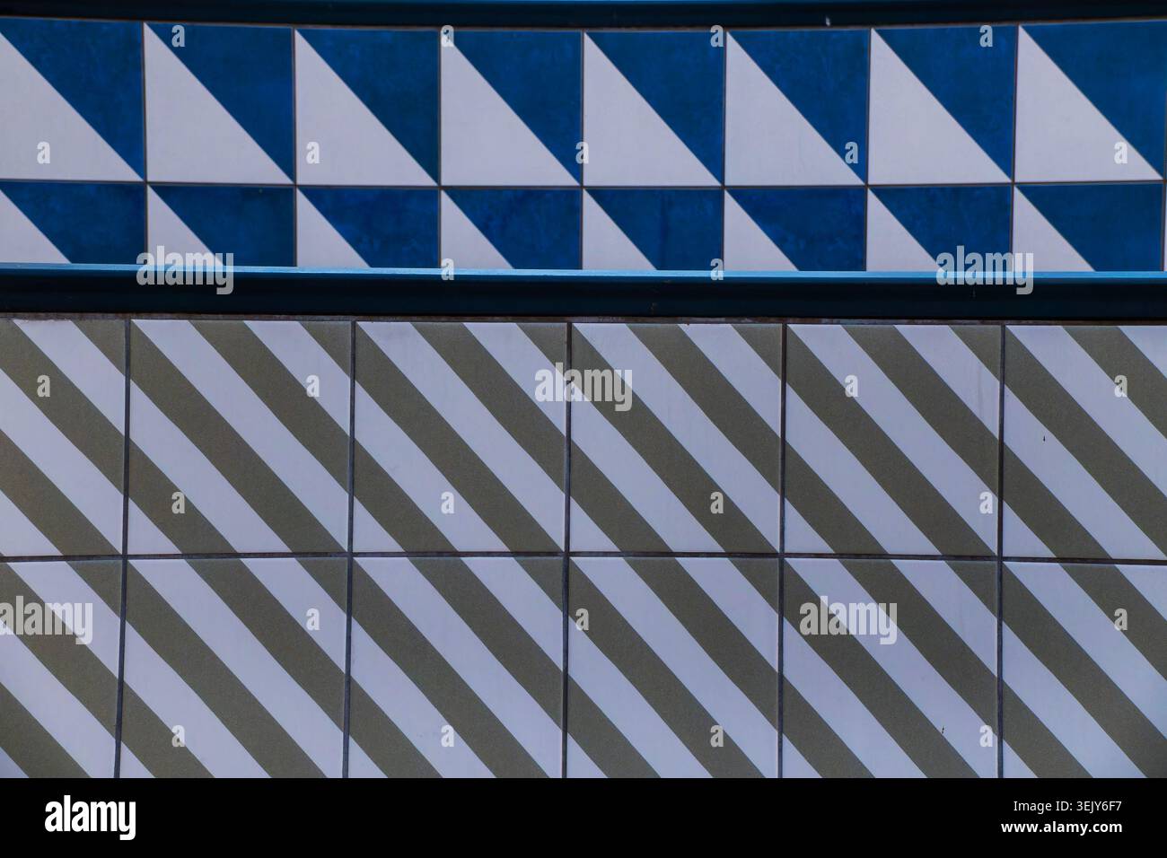 Geometric tile designs on a wall Stock Photo