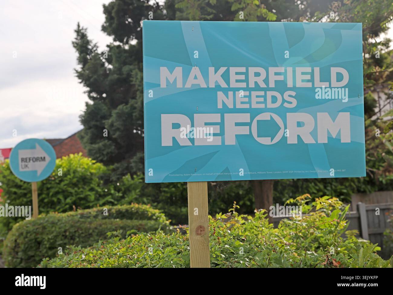 Two Reform UK signs indicating widespread ReformUK support on Bolton Road, Ashton-in-Makerfield, during the June 2026 Makerfield by-election campaign. Stock Photo